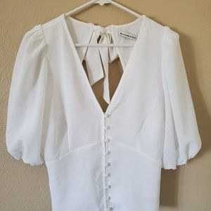 White top with blossom sleeves